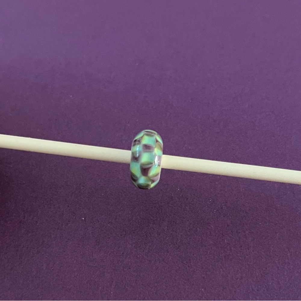 Trollbeads Retired turquoise and purple chess board bead. TGLBE-10242.